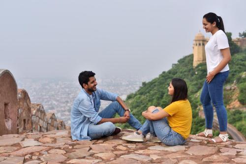 a group of people sitting on top of a mountain at Four Points by Sheraton Jaipur, City Square in Jaipur
