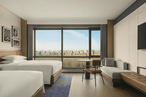 Postel nebo postele na pokoji v ubytování Four Points by Sheraton Changchun West