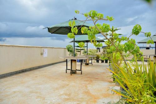 Balkón nebo terasa v ubytování Stylish Studio with Rooftop Pool in Nairobi-JoJo Homes