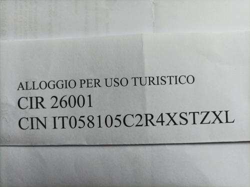 a white paper with the words albuquerque per usos tucson at Casa dei Faggi in Tolfa