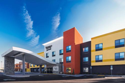 a rendering of a building with awning in front of it at Fairfield Inn & Suites by Marriott Fresno Yosemite International Airport in Fresno