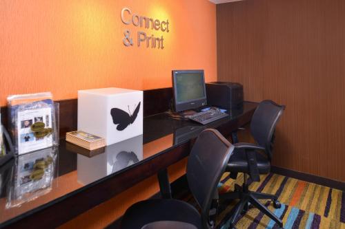 an office with a desk with a laptop computer on it at Fairfield Inn & Suites by Marriott Helena in Helena