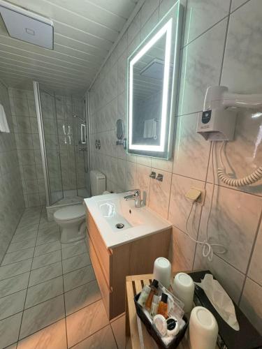 Koupelna v ubytování Hotel Harbauer