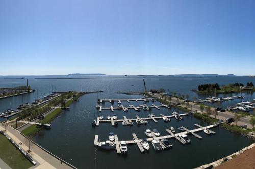 an aerial view of a marina with boats in the water at Delta Hotels by Marriott Thunder Bay in Thunder Bay