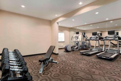 a fitness room with several treadmills and exercise bikes at Fairfield Inn & Suites by Marriott Mankato in Mankato