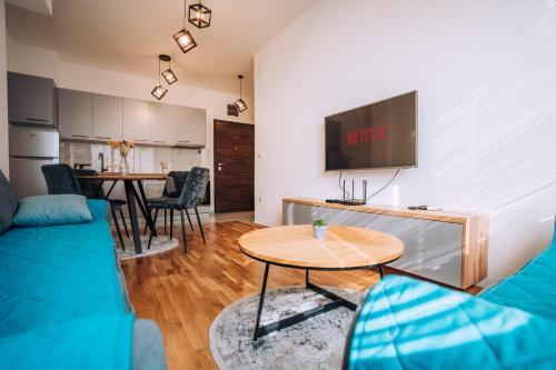 a living room with a couch and a table at Luxury Lake Nearby Free Parking Pet Friendly APT in Ohrid