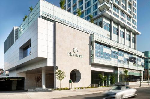 a car driving past a building with a cazon sign at Element by Westin Vancouver Metrotown in Burnaby