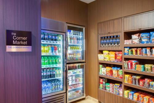 a store store with a large refrigerated refrigerator at Fairfield Inn & Suites By Marriott Fort Lauderdale Downtown/Las Olas in Fort Lauderdale