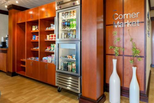 a refrigerator in a store with two white vases at Fairfield Inn & Suites by Marriott Yuma in Yuma