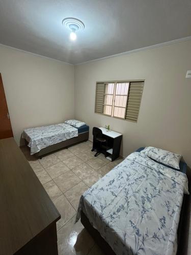 เตียงในห้องที่ Cantinho do Sossego