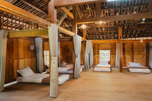 Katil atau katil-katil dalam bilik di Cốm Homestay Bảo Lạc