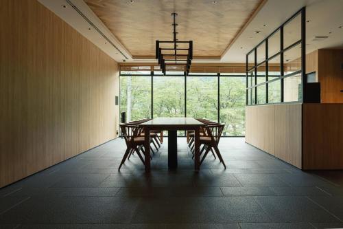 a dining room with a table and chairs at Fairfield by Marriott Gifu Mino in Mino