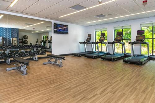a gym with treadmills and elliptical machines at Four Points by Sheraton Deadwood in Deadwood