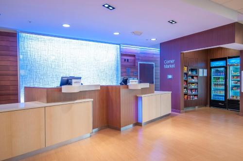 a store lobby with a cash register and a counter at Fairfield Inn & Suites by Marriott LaPlace in Laplace
