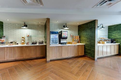 a kitchen with wooden counter tops in a room at Fairfield Inn & Suites Southport in Southport