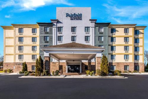 a rendering of a hotel with a parking lot at Fairfield by Marriott Inn & Suites Greensboro Coliseum Area in Greensboro