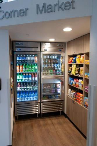 a cooler in a store with drinks and food at Fairfield Inn & Suites by Marriott Spokane Valley in Spokane Valley
