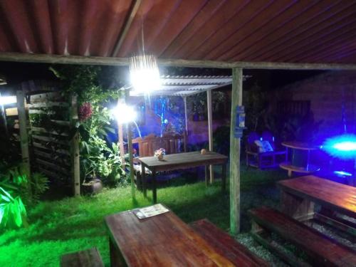 Κήπος έξω από το Casa confortável - 15min da praia