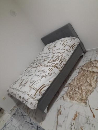 เตียงในห้องที่ Makse apartman