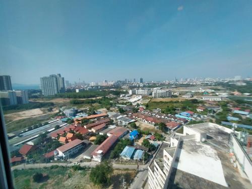 a view of a city from a building at The Empire Tower Jomtien KZi 2205 in Jomtien Beach