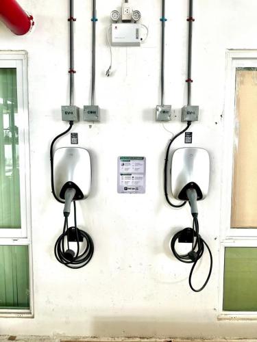 two hair dryers hanging on a wall at The Empire Tower Jomtien KZi 2205 in Jomtien Beach