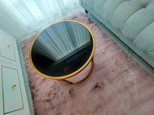 a mirror sitting on the floor in a room at The Empire Tower Jomtien KZi 2205 in Jomtien Beach