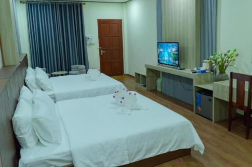Peaceful Hotelにあるベッド