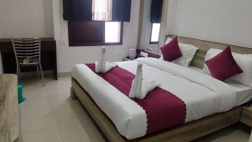 Katil atau katil-katil dalam bilik di Hotel Neu-Nest