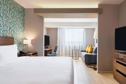 Ένα ή περισσότερα κρεβάτια σε δωμάτιο στο Fairfield Inn & Suites by Marriott Aguascalientes