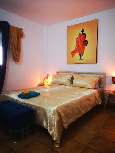 a bedroom with a bed in a room at Puerto de Mogan Sonneland in Puerto de Mogán
