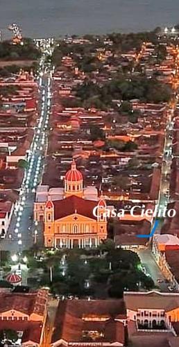 an aerial view of a city at night at Central Park Luxurious Historical Home With Pool in Granada
