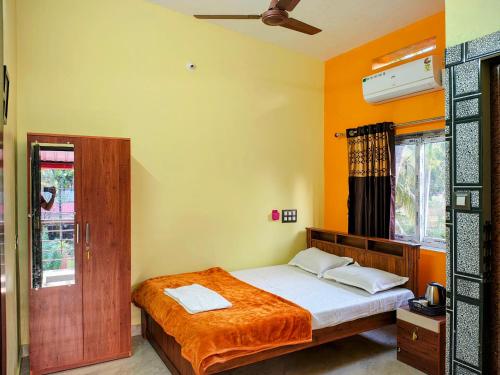 Katil atau katil-katil dalam bilik di Gokarna Thayi Krupa Homestay
