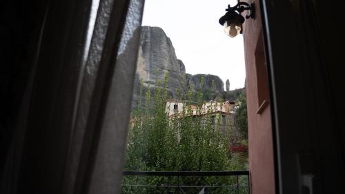 a view from a window of a castle at Rooms Batalogianni in Kalabaka