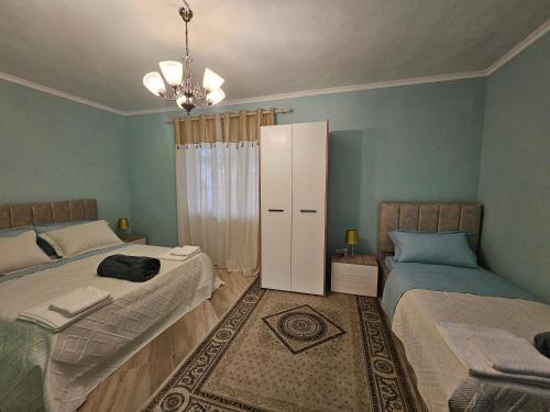 Postel nebo postele na pokoji v ubytování Bob Marley Bnb & Hostel
