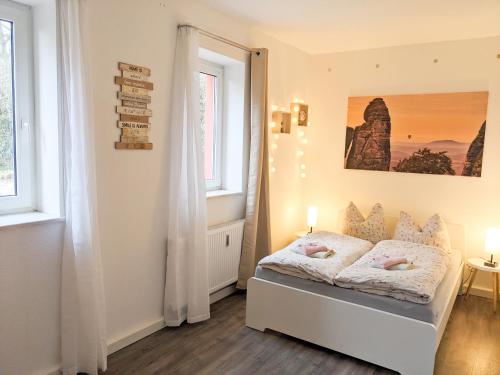 Postel nebo postele na pokoji v ubytování W6 - Gemütliche Wohnung in Lichtenhain