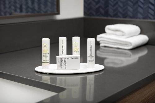 a counter with four tubes of toothpaste on a table at Fairfield Inn & Suites by Marriott Santa Rosa Rohnert Park in Rohnert Park