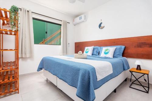 Arpoador Apts Praia & Piscina - Buzios Rentalsにあるベッド
