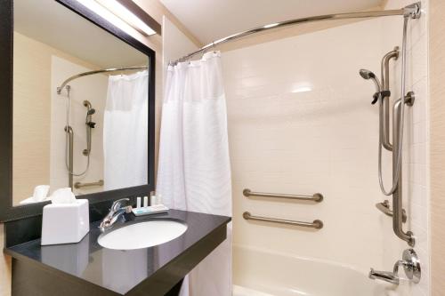 a bathroom with a sink and a shower at Fairfield Inn & Suites Idaho Falls in Idaho Falls