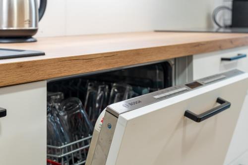 Küche/Küchenzeile in der Unterkunft Apartmány Rezidence Lyžařská
