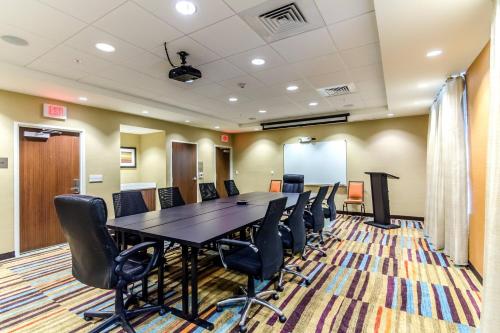 a conference room with a table and chairs at Fairfield Inn & Suites by Marriott Panama City Beach in Panama City Beach