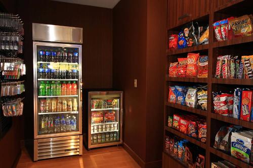 a store with a soda refrigerator in a room at Fairfield Inn & Suites by Marriott London in London