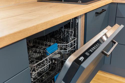 Küche/Küchenzeile in der Unterkunft Apartmány Rezidence Lyžařská