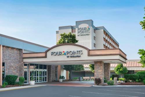 a view of the front of a four point points hotel at Four Points by Sheraton Chicago O'Hare in Schiller Park