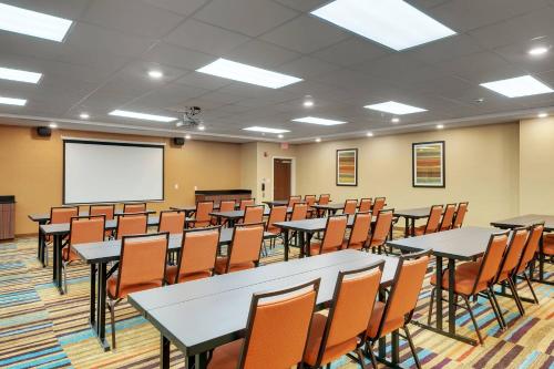 a classroom with tables and chairs and a whiteboard at Fairfield Inn by Marriott Houston Northwest/Willowbrook in Houston