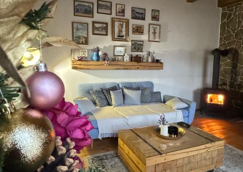 a living room with a couch and a coffee table at Dom na hradbách in Levoča