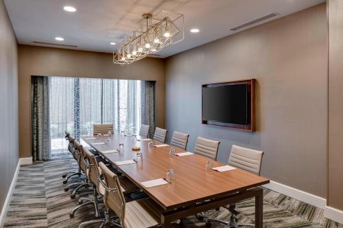 a large conference room with a long table and chairs at North Charleston Marriott in Charleston