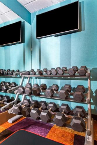 a gym with a rack full of chocolate bars at Rodeway Inn in Pensacola