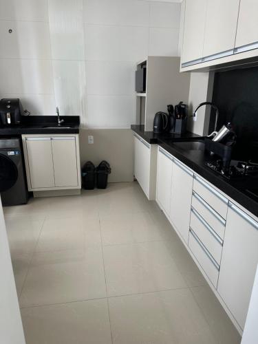 Η κουζίνα ή μικρή κουζίνα στο Coração de Capão