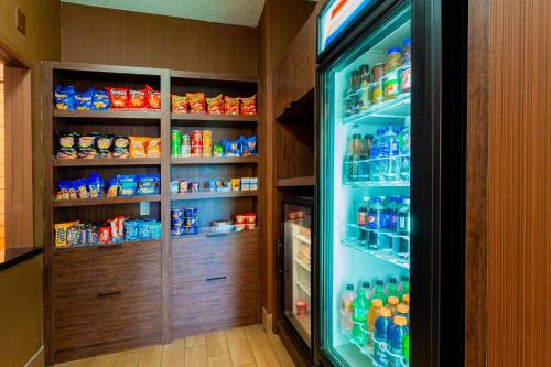 a refrigerator filled with lots of food and drinks at Fairfield Inn by Marriott Ponca City in Ponca City