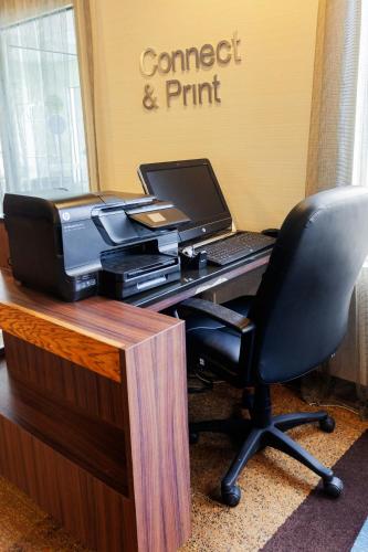 an office with a desk with a printer and a laptop at Fairfield Inn by Marriott Ponca City in Ponca City